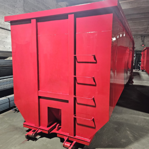 A massive 40-yard roll-off dumpster ready for a large-scale demolition project.